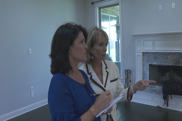 Re/Max agents talking in house